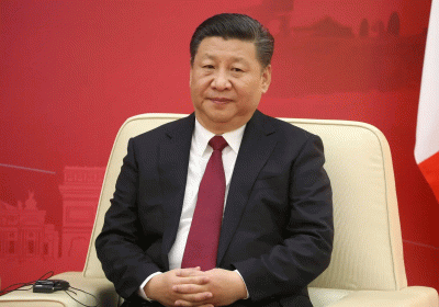 Chinas President Xi Jinping vows to minimize the economic impact of Covid spike